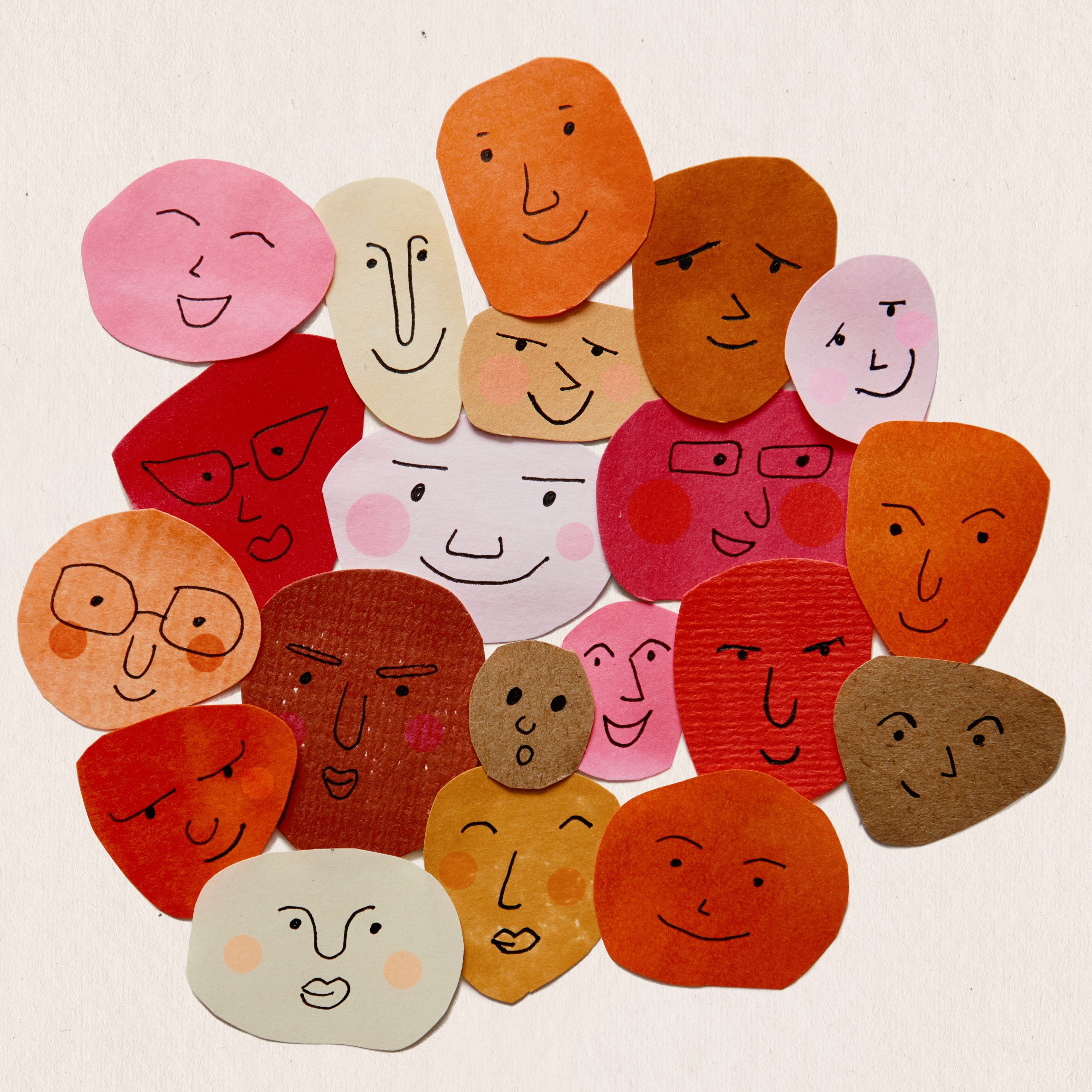 a group of faces drawn on paper supporting sel check in