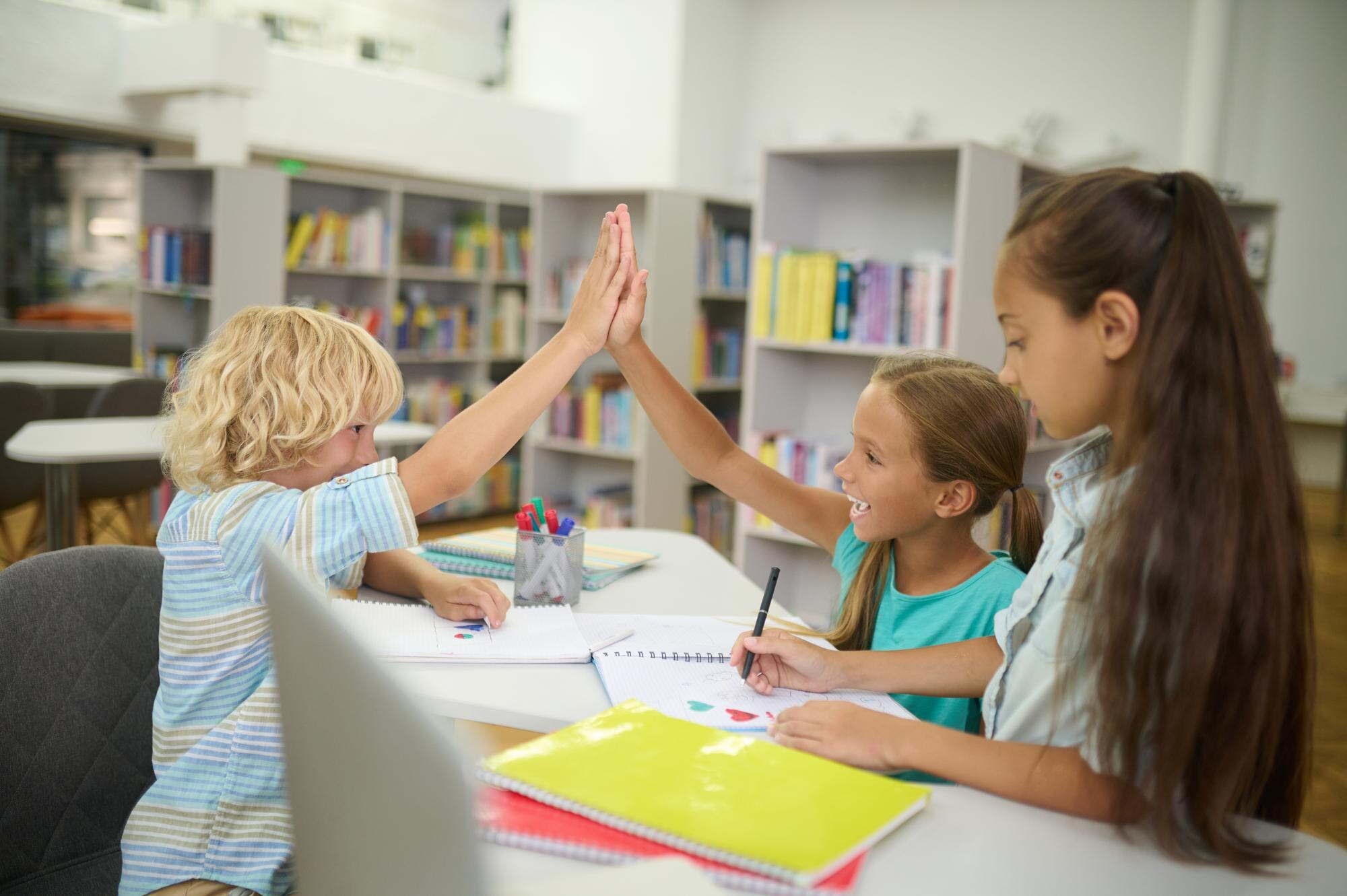 Children doing high five