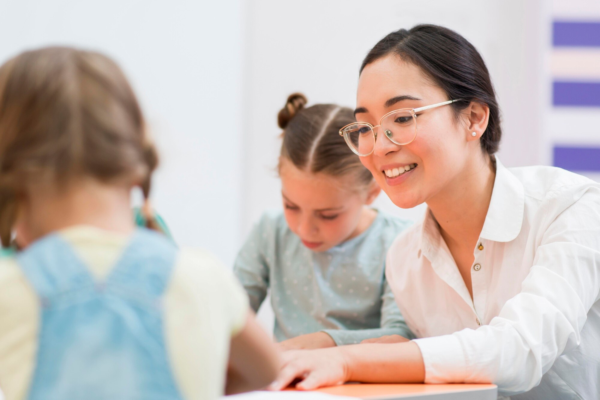 Teacher patiently teaching a student