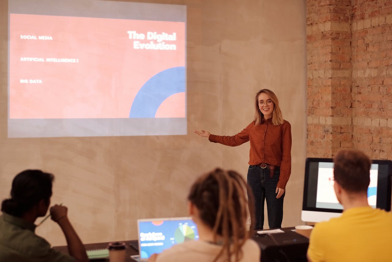 Worker presenting in front of a crowd